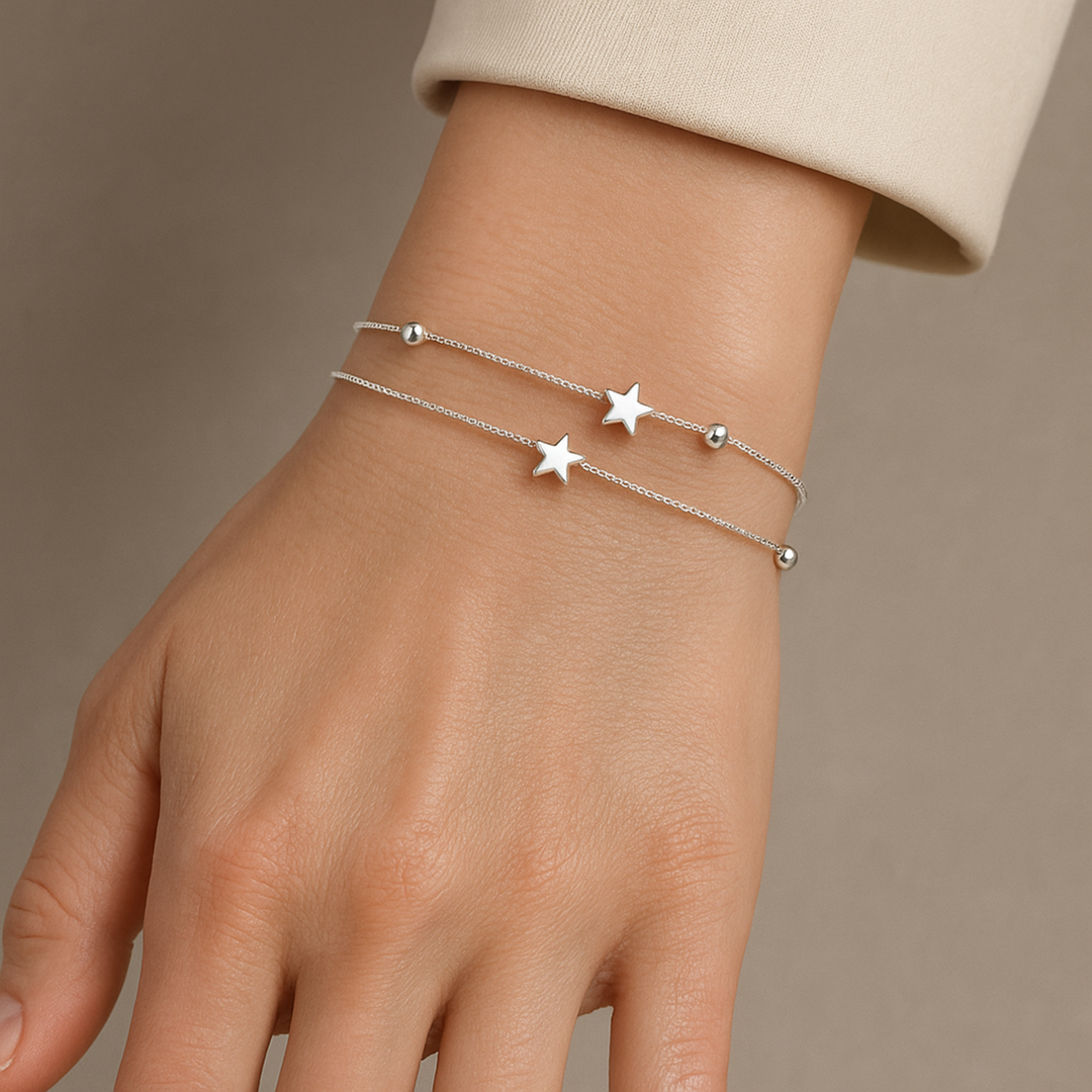 SILVER BRACELET WITH STAR CHARMS